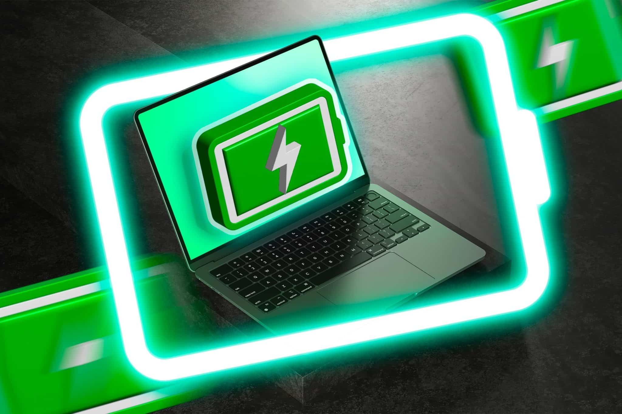 桌子上的筆記型電腦上有一些電池圖標