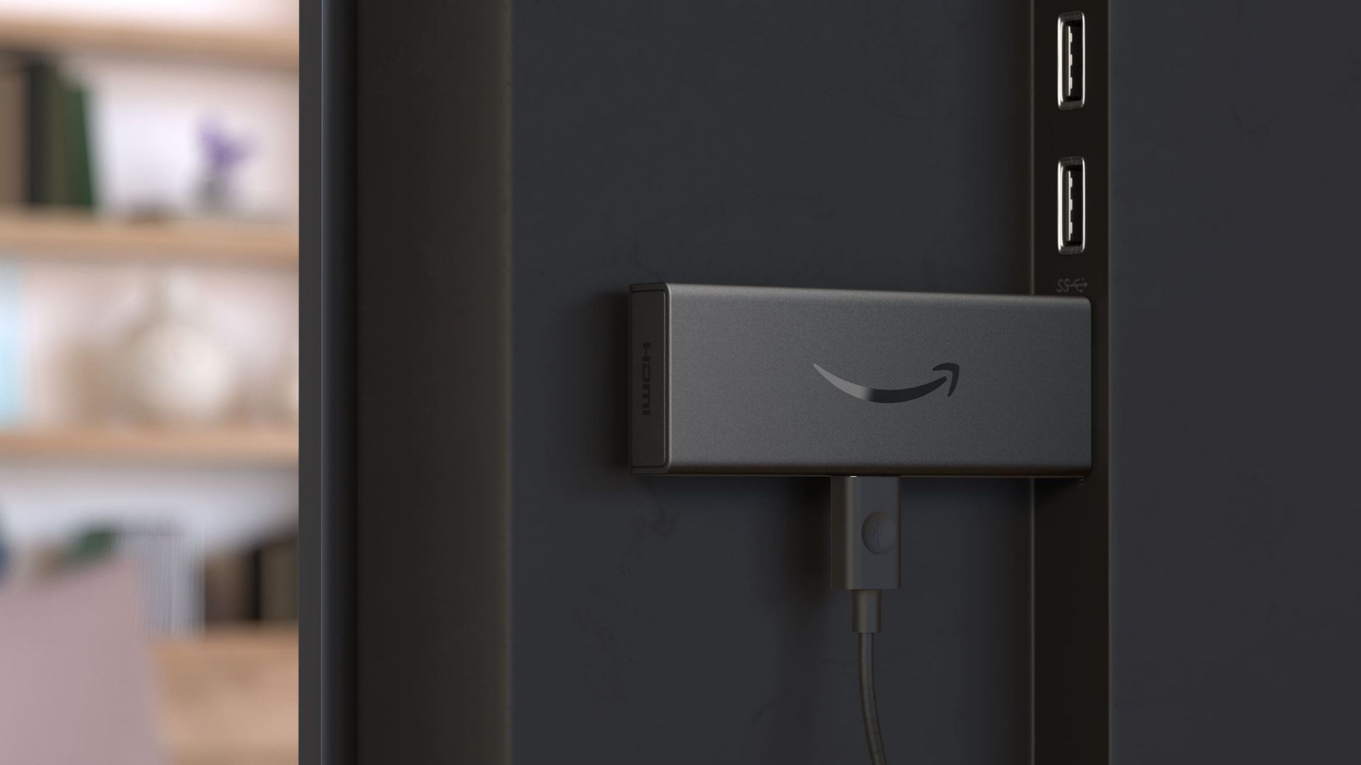 Fire TV stick συνδεδεμένο στη θύρα HDMI στο πίσω μέρος της τηλεόρασης-1
