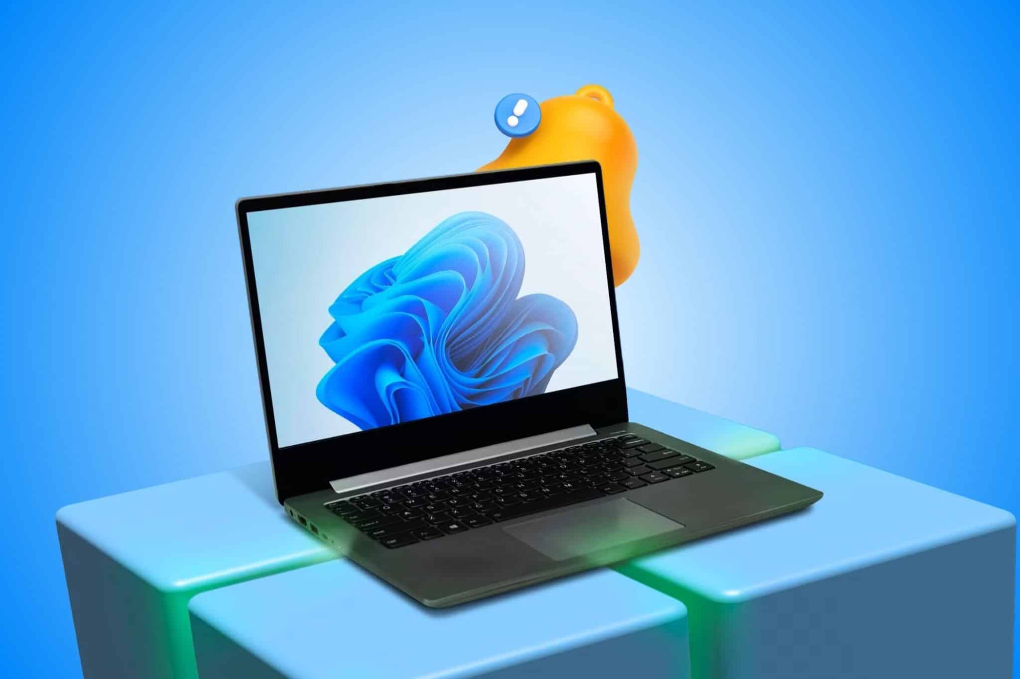 Computer portatile con logo Windows 3D e icona della campana di notifica sullo sfondo