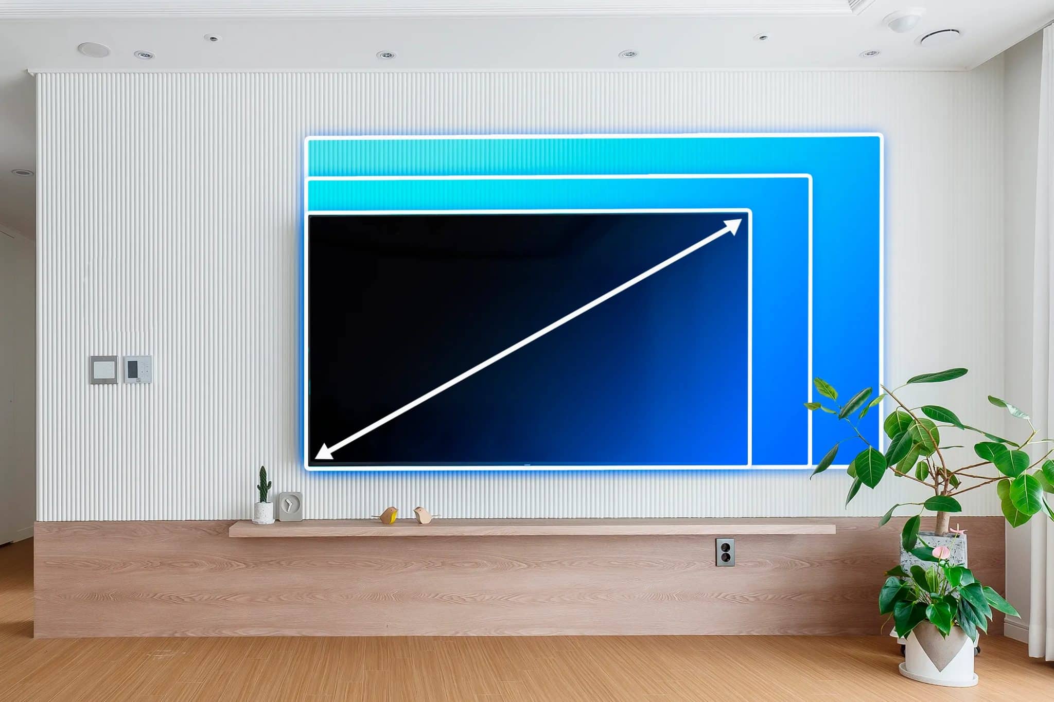 Una stanza con una TV e linee che indicano le diverse dimensioni dei televisori.