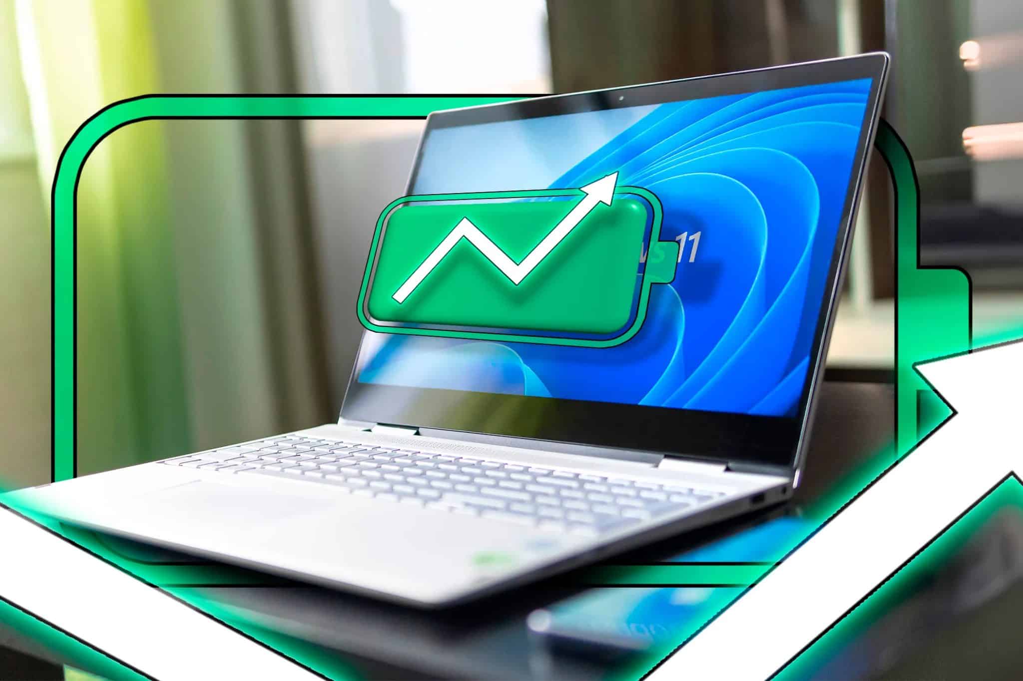 Um laptop com Windows 11 exibe um ícone de bateria cheia e uma seta voltada para cima indicando que a bateria está carregando.
