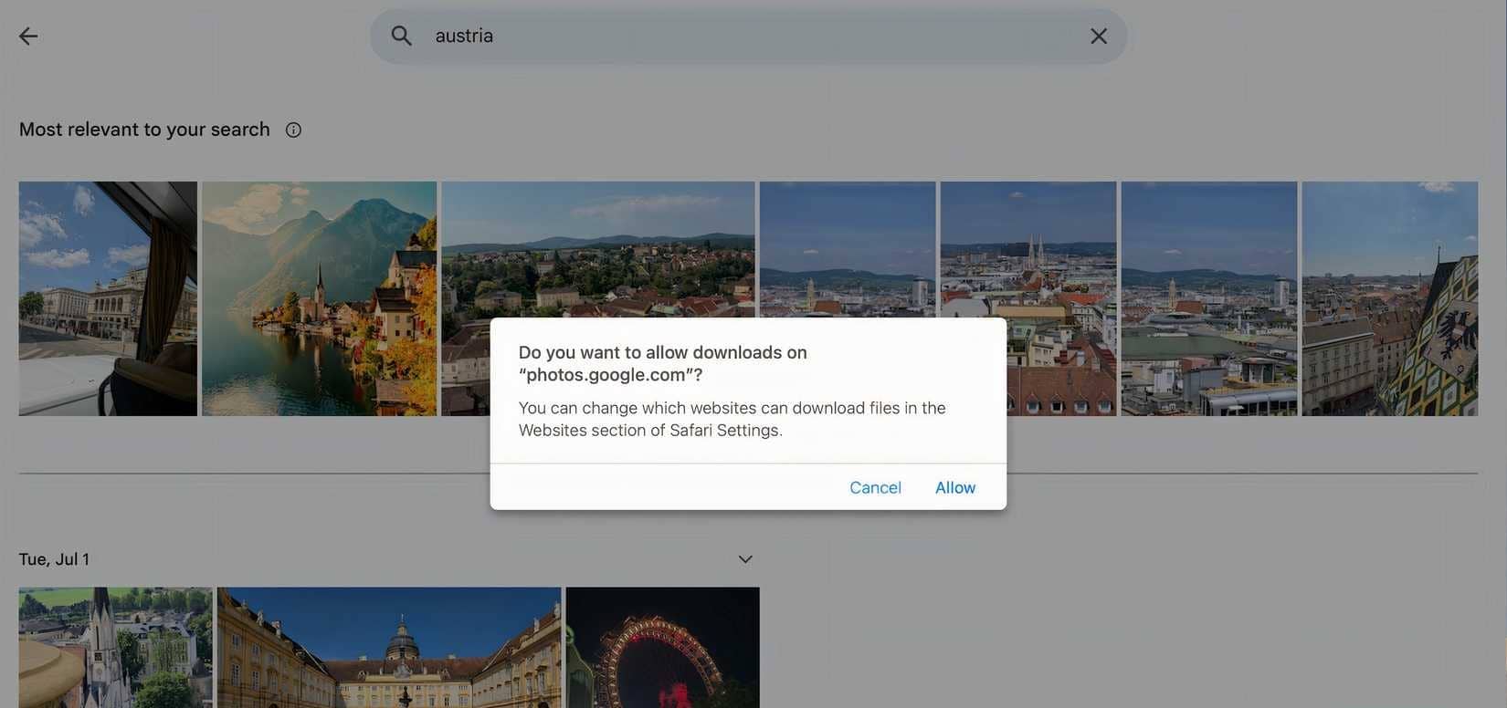 Screenshot che mostra il processo di download dei contenuti da Google Foto.