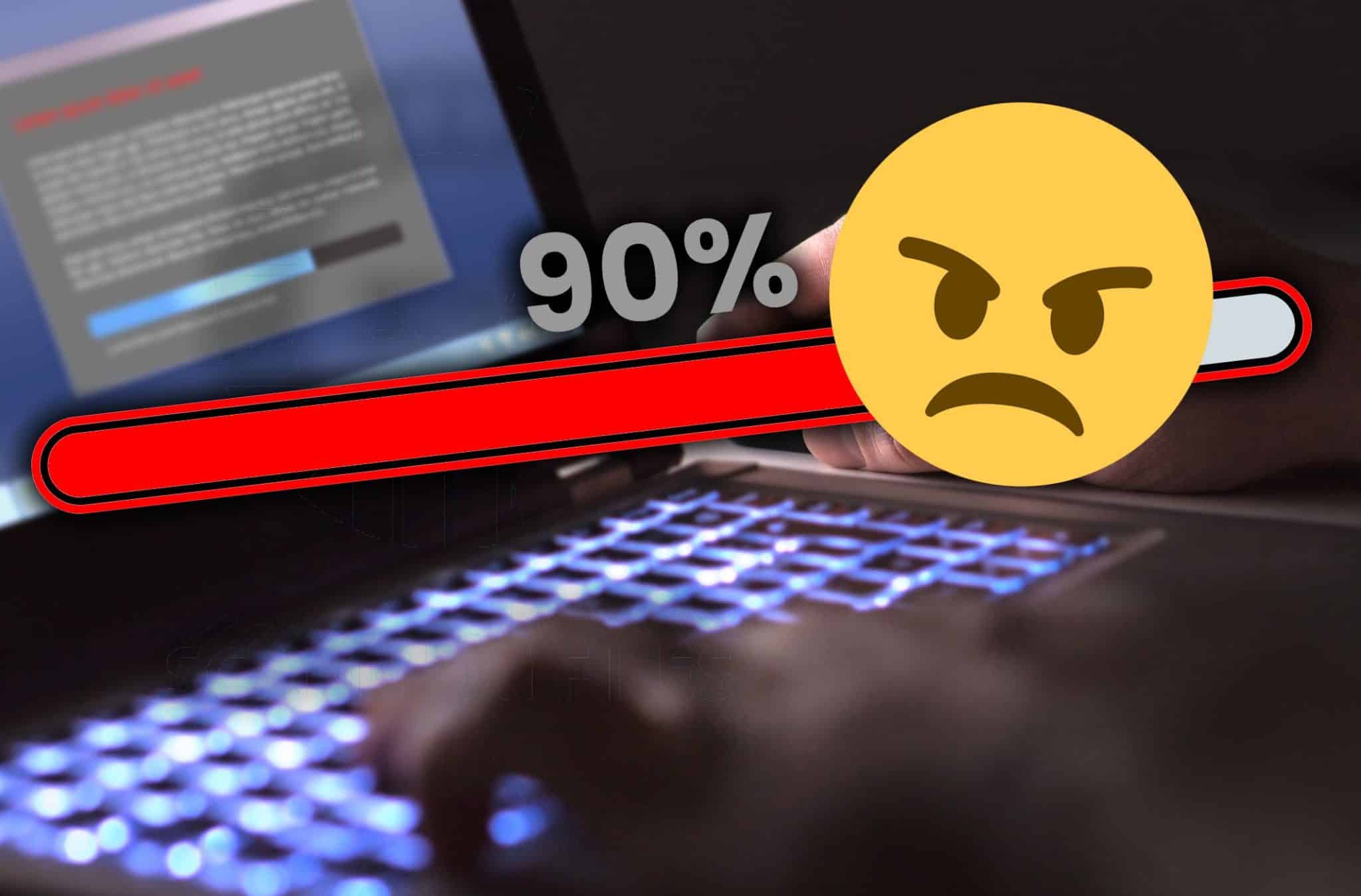 شخص يقوم بتشغيل فحص مكافحة الفيروسات عالق عند 90 بالمائة مع رمز تعبيري غاضب