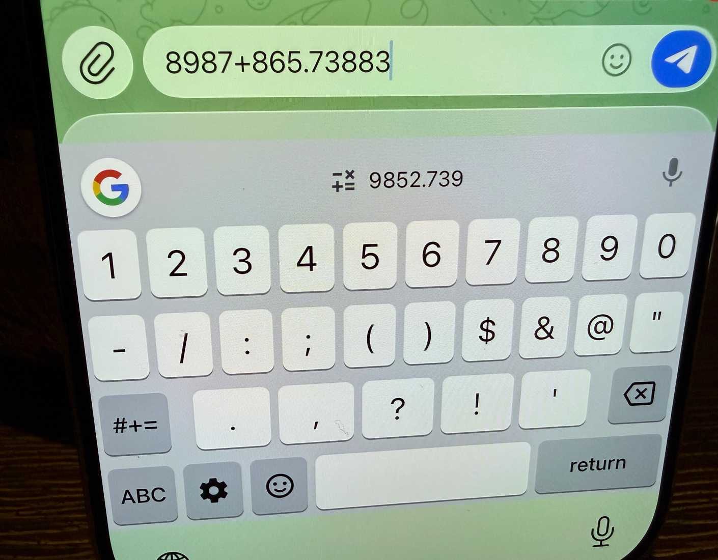 آلة حاسبة في Gboard على iOS