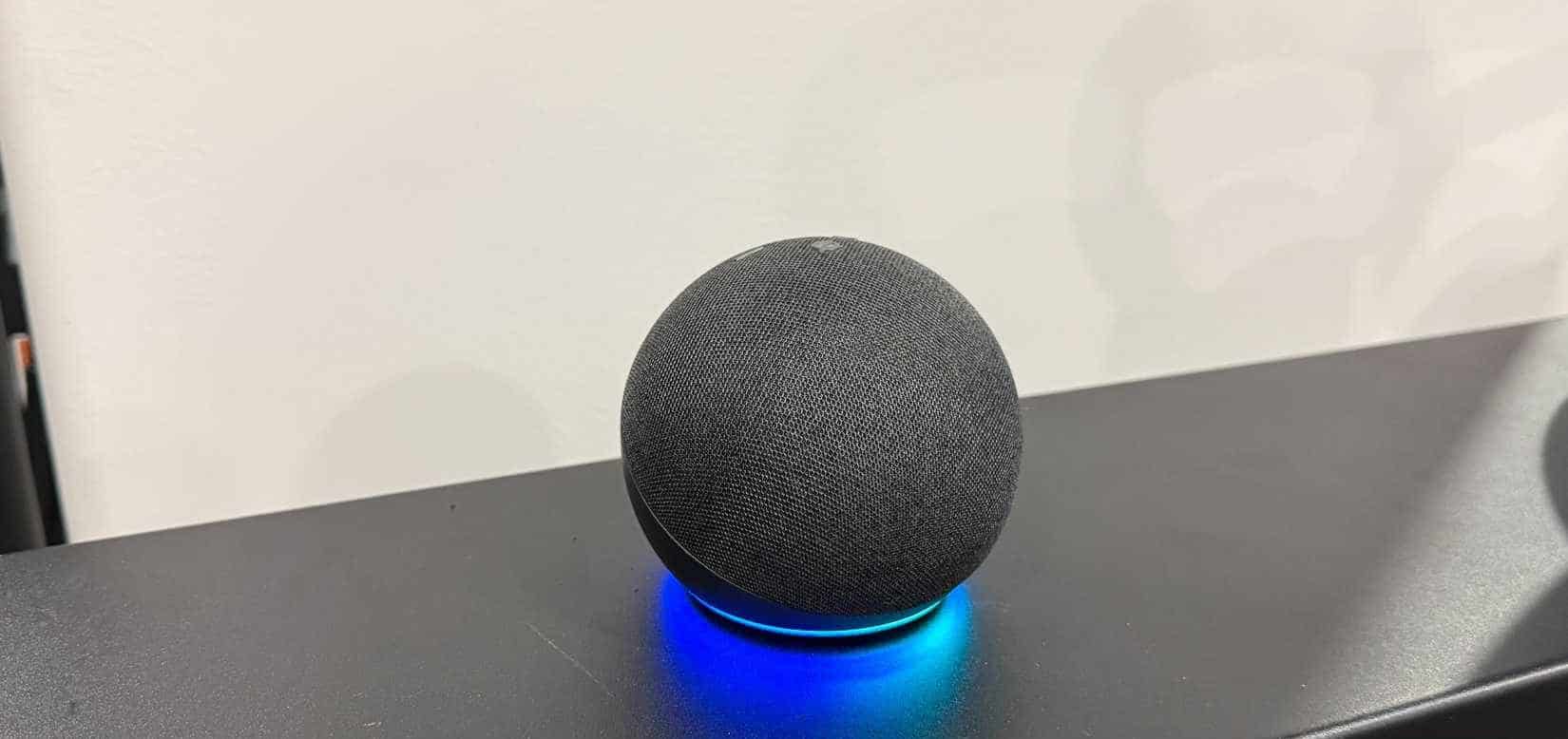 echo dot on black table