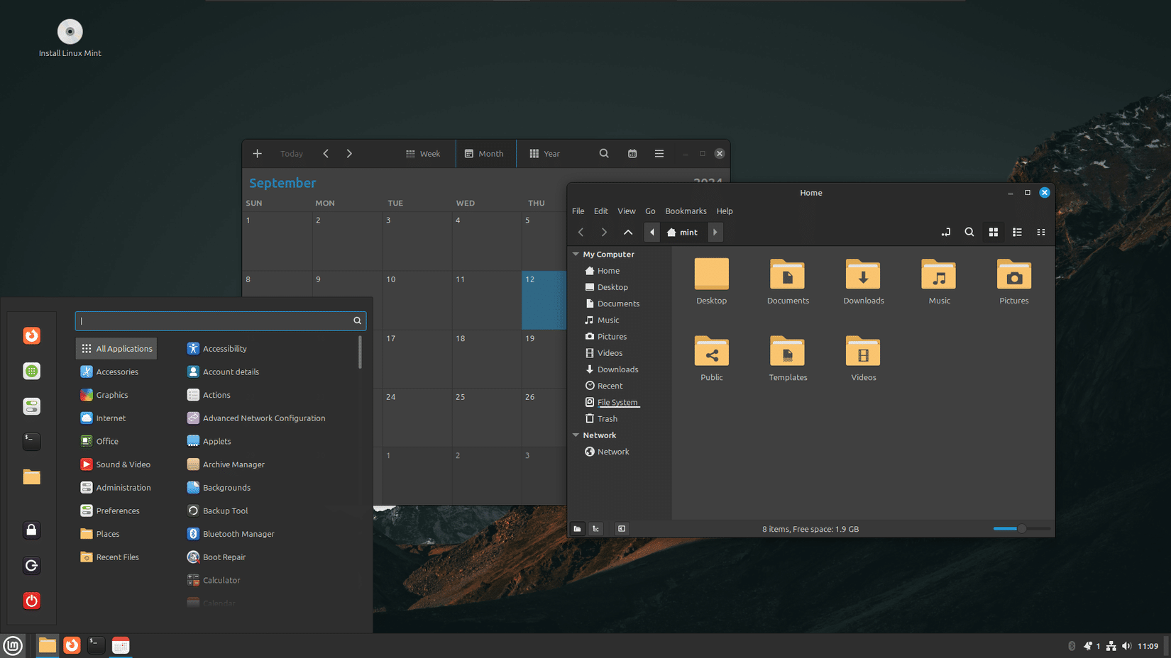 سطح مكتب Linux Mint مع تطبيق تقويم ومتصفح ملفات مفتوح